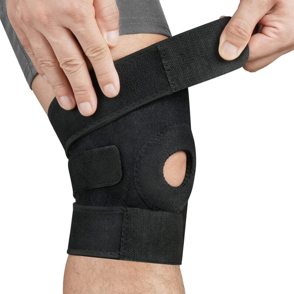 Tutore ginocchio con supporto regolabile e apertura rotula.